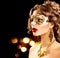 Beauty model woman wearing venetian masquerade carnival mask