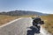 Beauty motobike on lanscape long road and field