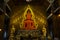 Beauty orange buddha statue for thai people and foreign travelers travel visit respect praying blessing with holy mystery at Wat