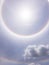 The beauty phenomenon is the sun halo on the sky at noon