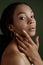 Beauty photo of young elegant African American woman with afro. Hands poses. Gentle portrait.  Fashion beauty close up portrait. N