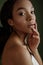 Beauty photo of young elegant African American woman with afro. Hands poses. Gentle portrait.  Fashion beauty close up portrait. N