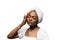 Beauty portrait of black muslim woman weared white dress and headscarf on white background. Softness and wellness of