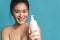 Beauty portrait of a smiling topless young asian woman