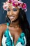 Beauty portrait of young african girl wearing flower garland.