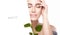Beauty portrait of a young woman with green leaves. Spa, skin care and cosmetology concept