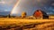 Beauty rainbow in storm cloud above autumn field landscape. Weather, nature background.