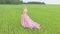 Beauty Romantic Girl standing in field