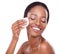 Beauty, skincare and face of black woman cotton pad, cleaning skin and natural spa makeup in studio. Wipe, dermatology