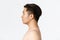 Beauty, skincare and hygiene concept. Close-up side view of asian man standing nude, naked in profile over white