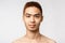 Beauty, skincare and men health concept. Headshot of handsome young asian man with no blemishes, perfect skin condition