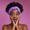 Beauty, skincare and shock, portrait of black woman with hand in face isolated on purple background. Surprise, wow and