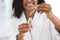 Beauty And Skincare. Smiling Black Woman Holding Bottle With Moisturizing Face Serum