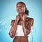 Beauty, skincare and water splash for black woman in studio for cleaning, shower and wellness with cosmetic and