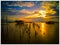 The beauty of the sky and the reflections on the lake surface before the sun goes down