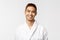 Beauty, spa and leisure concept. Young smiling, cheerful asian man grinning at camera delighted after awesome massage at