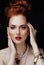 Beauty stylish redhead woman with hairstyle and