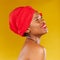 Beauty, thinking and African woman with makeup and head wrap with smile isolated in yellow studio background. Happy