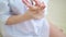 Beauty woman applying cosmetic hand cream on hand on bedroom background.