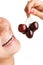 Beauty woman eat cherries