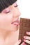 Beauty woman eating chocolate