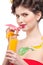 Beauty woman with fruit bodyart and juice