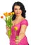 Beauty woman offering a fresh tulip