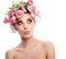 Beauty woman portrait with wreath from flowers on head over whit