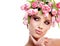 Beauty woman portrait with wreath from flowers on head over whit