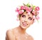 Beauty woman portrait with wreath from flowers on head over whit
