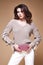 beauty woman pretty face young wear white pants beige sweat