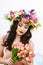 Beauty Woman with Spring Flower bouquet. Beautiful girl with a B