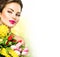 Beauty woman with spring flowers bouquet