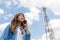 Beauty women use smart phone call and satellite communication tower