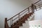 beauty wooden stair in new house . oak color iron Handrail decor interior estate
