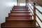 Beauty wooden stair in new house . oak color iron Handrail decor interior estate. abstract going up to goal