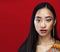 Beauty young asian girl with fashion make up on red background , beauty stylish look