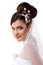 Beauty young bride with beautiful makeup na hairdress in veil