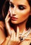 Beauty young sencual woman with jewellery close up, luxury portrait of rich real girl