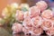 Beautyful bouquet of pink artificial roses placed on the table