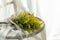 Beautyful yellow flower bouquet with white linen cloth on wooden chair