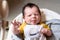 Bebe with yellow and white body lying on baby hammock