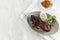 Bebek Goreng. Popular Indonesian Dish of Deep Fried Duck, Served with Red Chili Paste