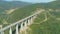 Bebresh Viaduct landscape with lake in the background and road going into mountain tunnel