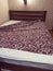 Bed with bedsheet cover mattress in bedroom