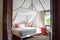 Bed room of a modern wooden house hotel in tropical country