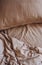 Bedding items bed beige pillow blanket textiles