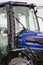 Bednary, Poland - September 25, 2021: Agroshow. Farmtrac brand tractor machine. Manufacturer agricultural equipment. Detail and