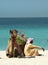 Bedouin with camel on the beach in Dubai