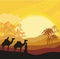 Bedouin camel caravan in wild africa landscape
